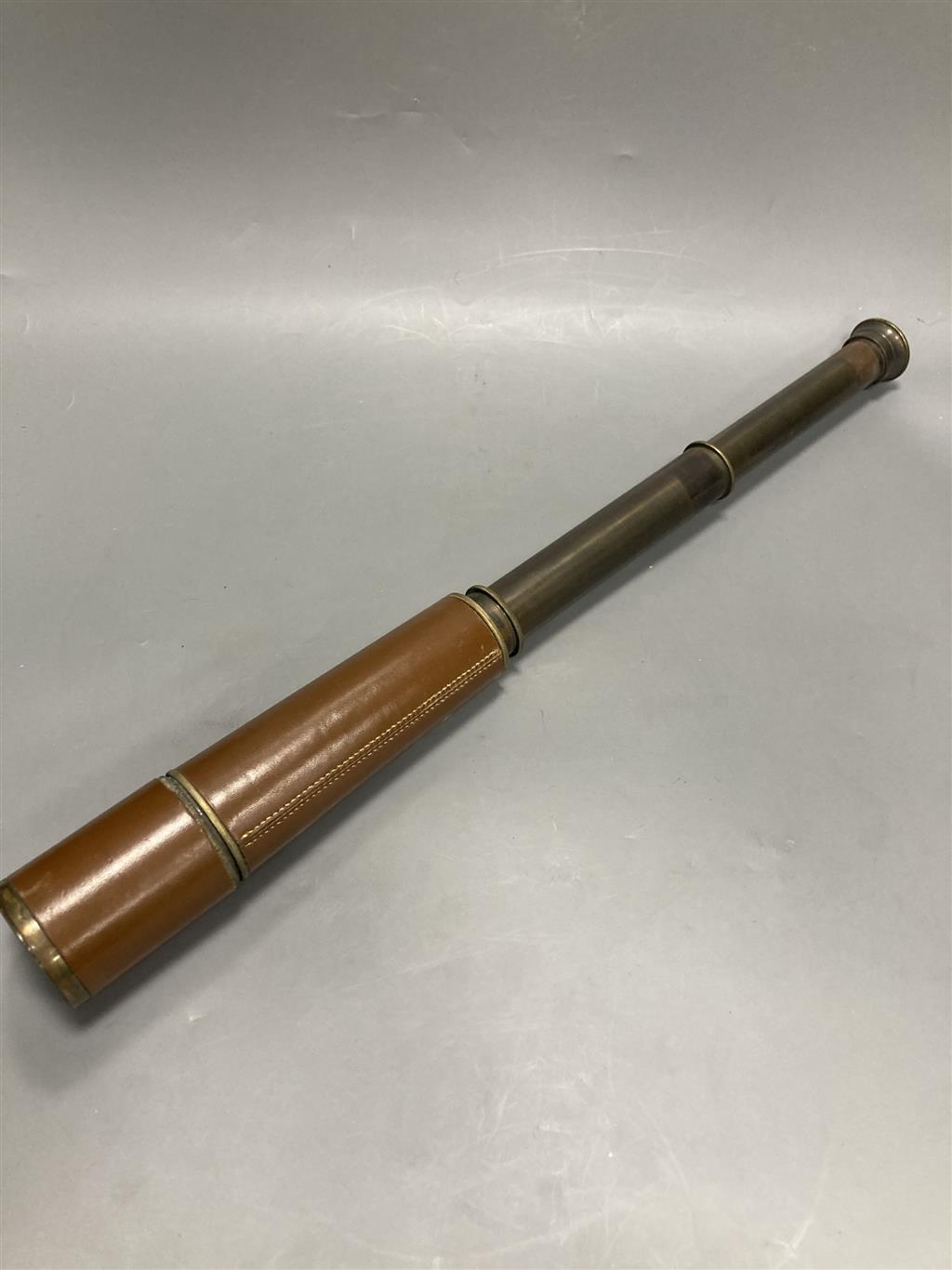 A Broadhurst & Clarkson brass three drawer telescope